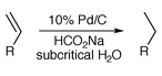 Catalytic reduction in subcritical water