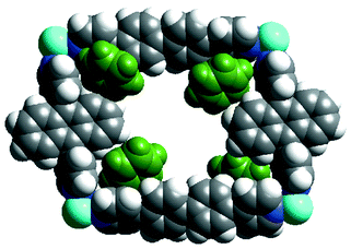 
          (a) Space filling representation of a rectangular grid unit in 
7. Note that this contains four benzene molecules.
        