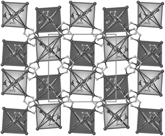 The crystal structure of 3. Coordination polyhedra of two different layers are marked in light grey and dark grey.